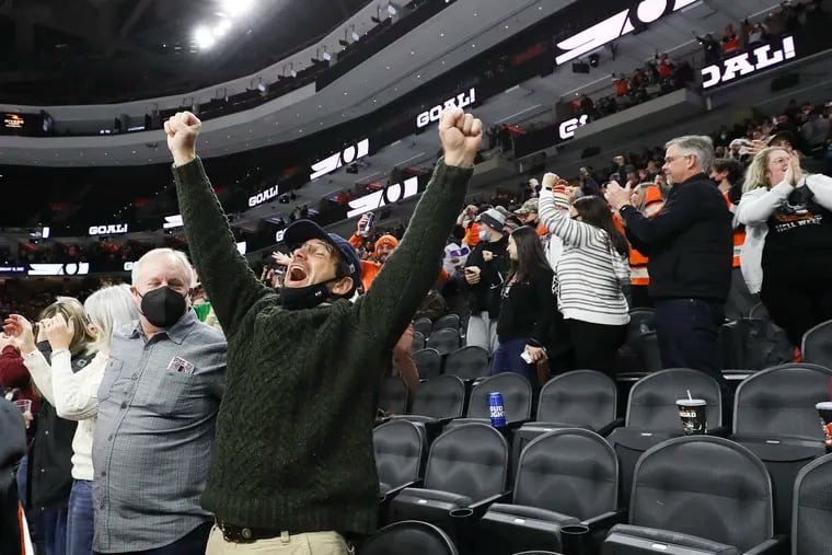 Flyers fans rejoiced after their team's 4-3 overtime victory Saturday over the Los Angeles Kings. The win ended a 13-game losing streak for the Flyers.