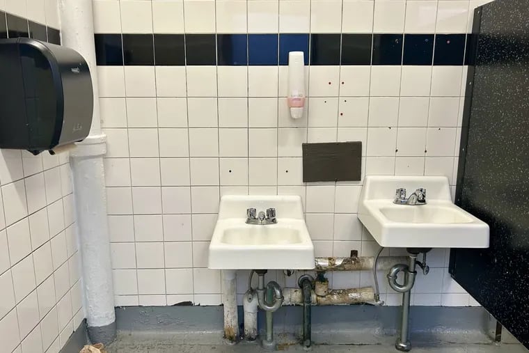 A student bathroom at a school in the Philadelphia School District. District records show that it takes 50 days to fix the average broken bathroom.