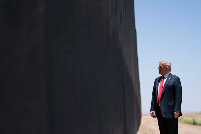 President Donald Trump tours a section of the border wall, Tuesday, June 23, 2020, in San Luis, Ariz. (AP Photo/Evan Vucci)