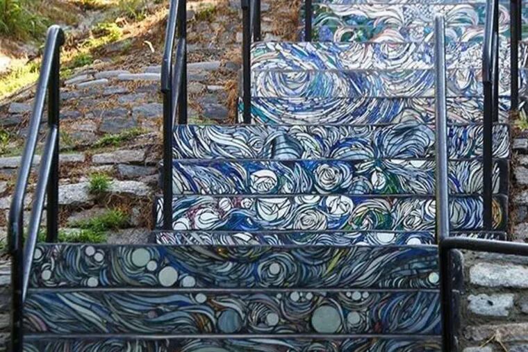 Artwork embellishes Manayunk's Fountain Street steps leading to the Schuylkill River Trail.