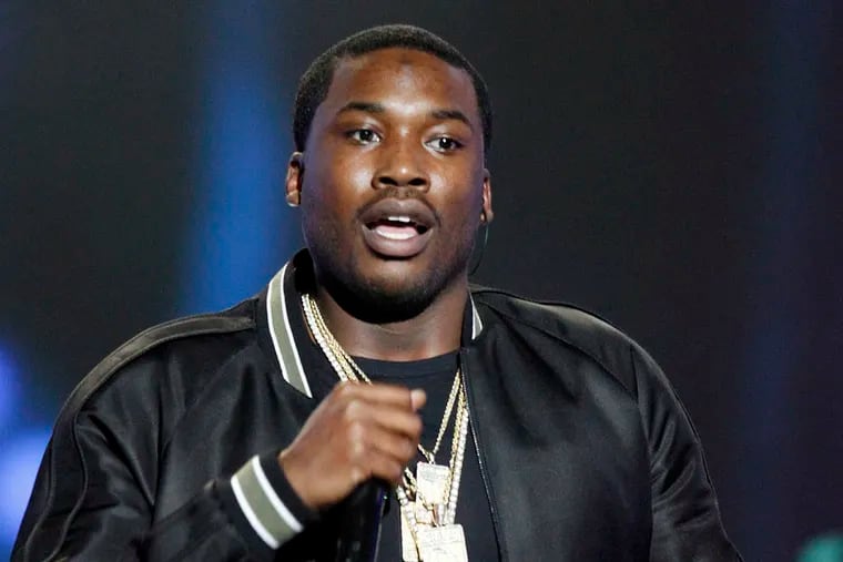 Meek Mill: Suing city, police Officer Alvin Outlaw and ex-cop Andre Boyer.