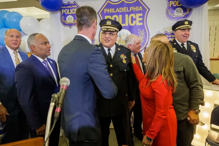 Newly appointed Deputy Police Commissioner Pedro Rosario (center) is greeted by members of City Council, Jim Harrity and Quetcy Lozada, as well as State Representative Danilo Burgos on Thursday, Jan. 11, 2024.