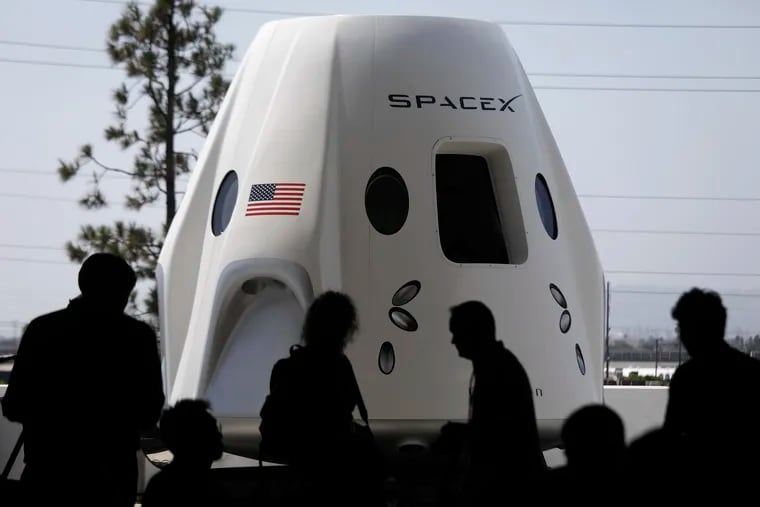 A mock-up of the Crew Dragon spacecraft was on display for members of the media at SpaceX on Aug. 13 in Hawthorne, Calif.