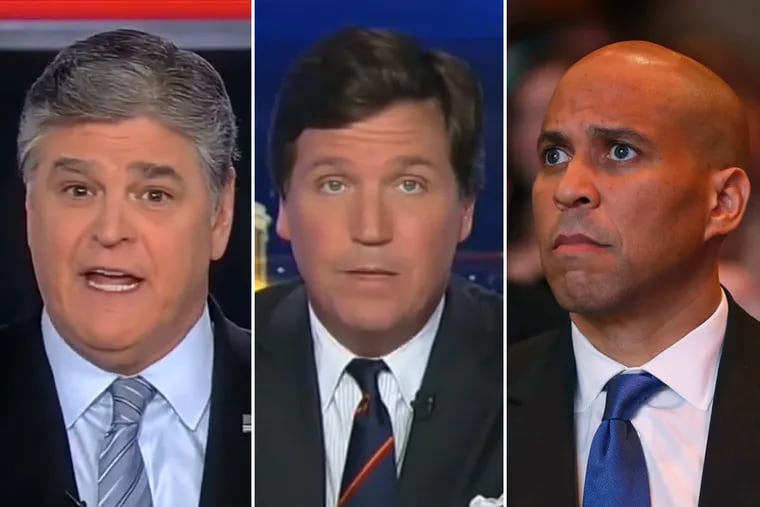 Fox News hosts Sean Hannity (left) and Tucker Carlson (center) both botched reports about New Jersey Senator and Democratic presidential candidate Cory Booker Wednesday night.