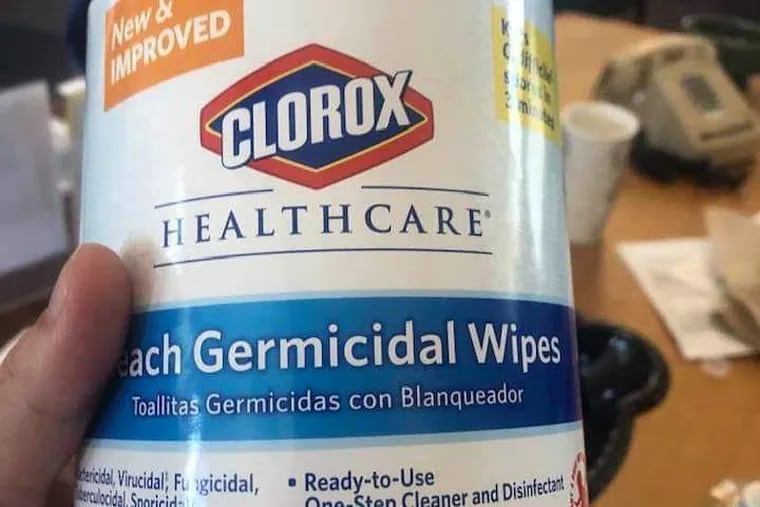 City library workers are concerned that there are not enough cleaning supplies to protect them from the coronavirus. This container of cleaning wipes help by a library employee expired in 2018.