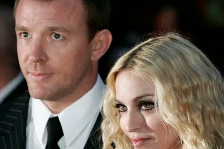 It&#0039;s immaterial, world: Guy Ritchie and Madonna say divorce details are private.