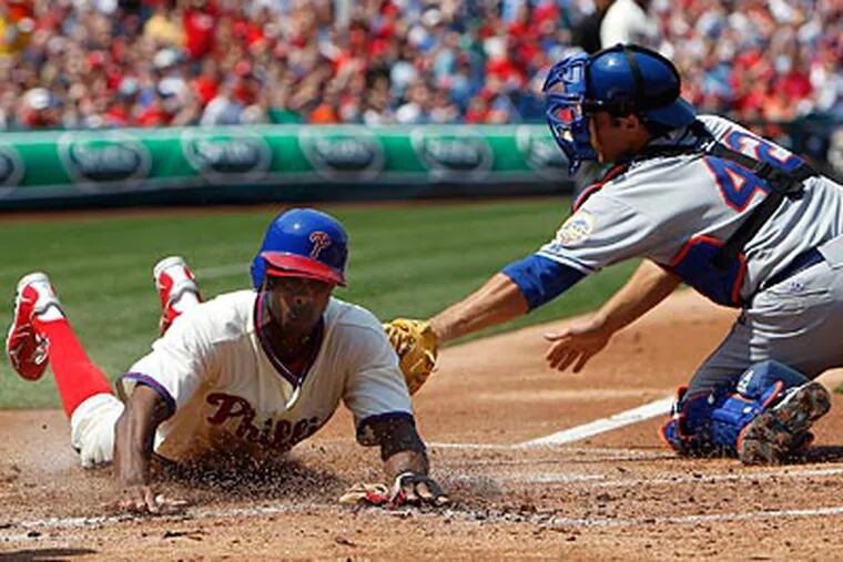 Juan Pierre slides home safely during a recent game against the Mets. (David Maialetti/Staff Photographer)