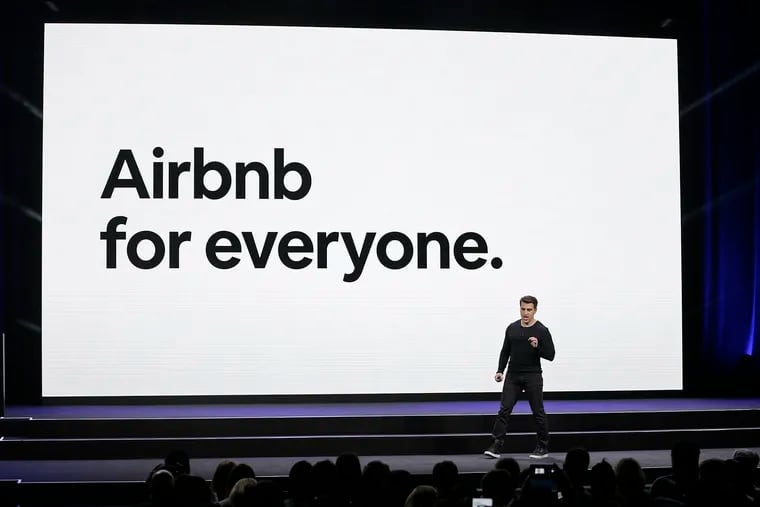 File photo shows Airbnb co-founder and CEO Brian Chesky speaking during an event in San Francisco.