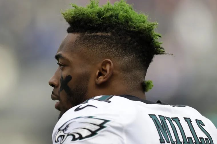 Eagles cornerback Jalen Mills, “the Green Goblin,” is hard to miss, on or off the field. YONG KIM / Staff Photographer