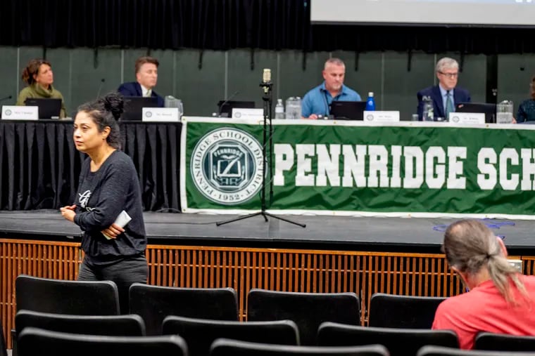 Attendees at a March 2022 meeting of the Pennridge School Board. Jonathan Zimmerman writes that the fight over a new curriculum there reflects "a diverse and fractured nation."