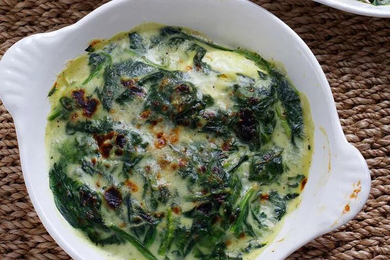 Spinach with bechamel and eggs. ( Photo for The Washington Post by Deb Lindsey )