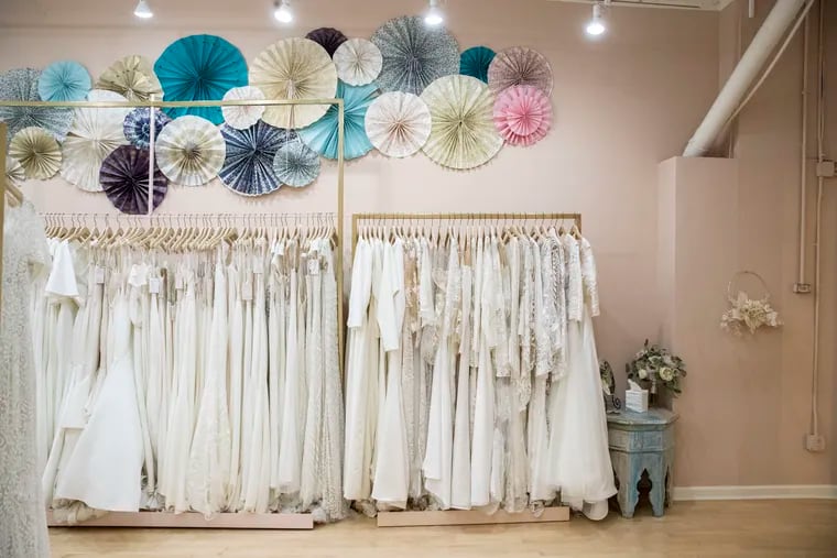 Wedding gowns line the walls of Lovely Bride in Philadelphia, Pa. on Thursday, August 27, 2020.