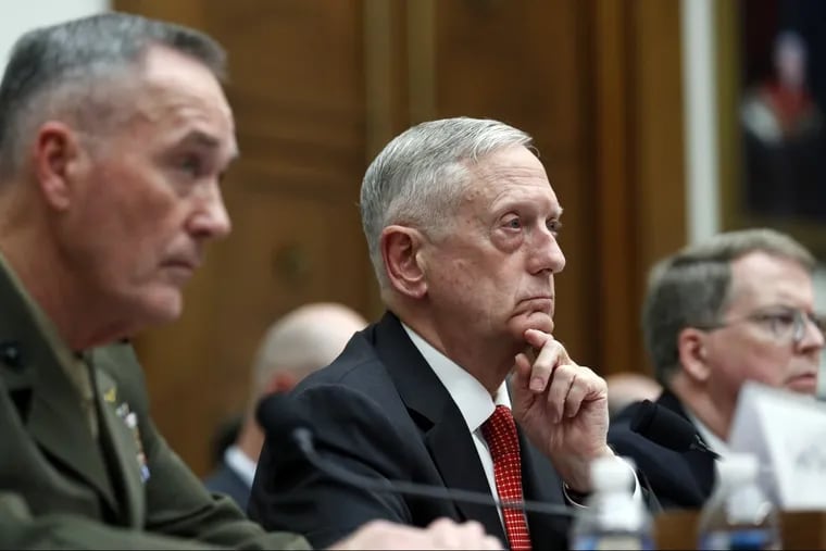 Joint Chiefs Chairman Gen. Joseph Dunford (left), Defense Secretary Jim Mattis, and Defense Under Secretary David Norquist at a House Armed Services Committee hearing.
