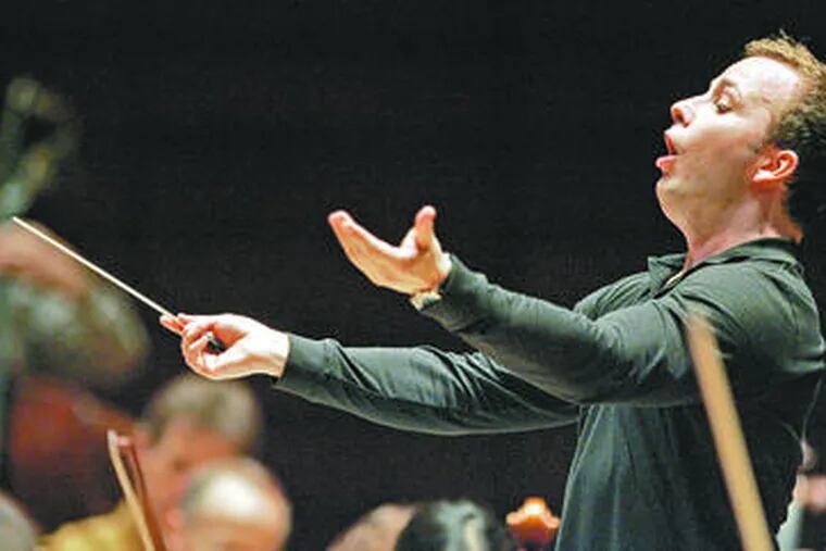 Montreal conductor Yannick N&#0233;zet-S&#0233;guin, 33, rehearses the Philadelphia Orchestra.