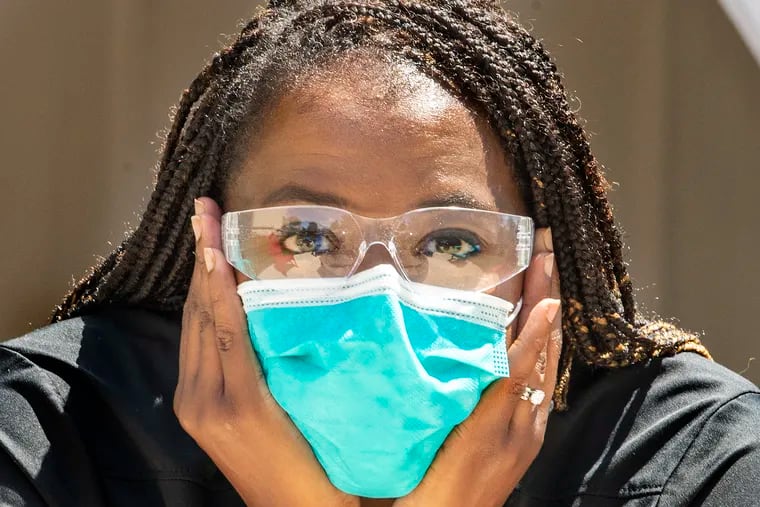 Dental hygienists like Tahita Ross of Newark, Del., are concerned about going back to work.