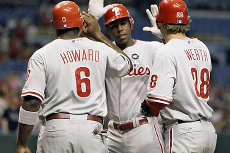 John Mayberry Jr. sparked the Phillies with a three-run homer in the first inning. (Chris O'Meara/AP)