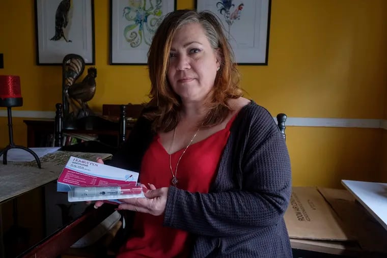 US patent laws have enabled some drug companies to maintain monopoly pricing (and rise prices dramatically) by building up a "patent thicket" that keeps out generic competition. Humira, which Elizabeth Dempler takes to treat Crohn's disease, is among the worst offenders.Elizabeth Dempler is seen here sitting in her dining room with her prescribed Humira medication. ED HILLE / Special to the Inquirer .