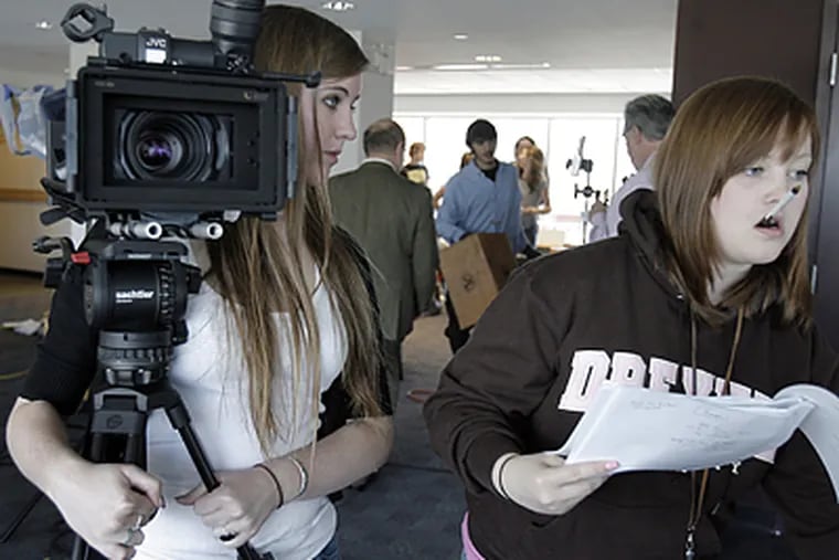 The student production crew of <i>University 101</i> at work on an episode of the show, which is filmed on Drexel's campus. (Akira Suwa/Inquirer)