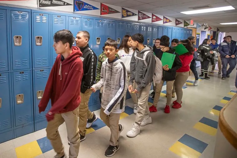 Eighth graders from Octavius V. Catto Community School walk the hallways of Freedom Prep High School as part of a tour of Camden's seven district and charter high schools to decide where to enroll next year.