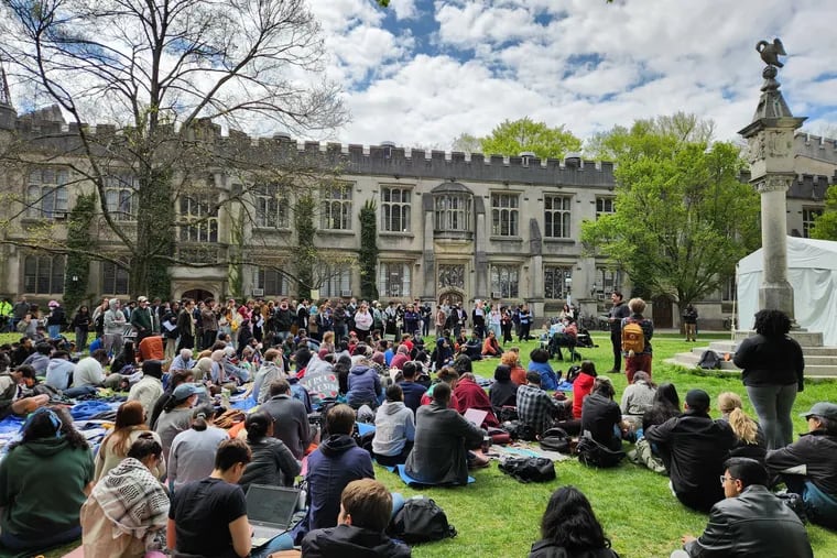 Students on the campus of Princeton University on April 25 after tents set up by protesters were taken down voluntarily. Two graduate students were arrested for trespassing.