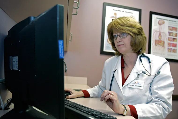 Susan Lynch, a nurse practitioner, checks over a patients electronic medical records, at the Central Florida Family Health Center in Sanford, Fla., Monday, March 2, 2009. For 14 straight years, a bill has been introduced in the Florida Legislature that would let nurse practitioners write prescriptions for potentially addictive drugs.(AP Photo/John Raoux)
