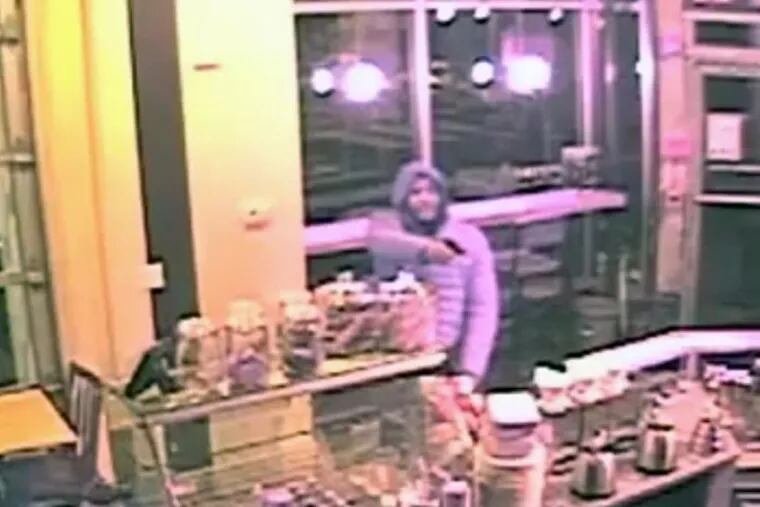 Police are looking for a man caught on camera Jan. 18 robbing Ultimo Coffee Bar in South Philadelphia.