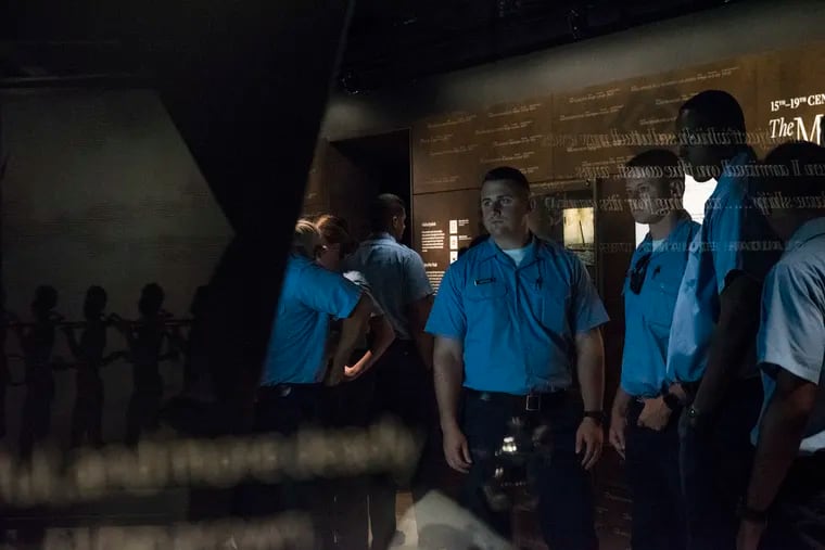 A group of over 100 Philadelphia police recruits tour the National Museum of African American History and Culture in Washington, D.C. on Tuesday, July 3, 2018. The trip was one of three museum-based training programs whose aim is to help the recruits understand the root and context of strained community-police relations through a historical perspective. HEATHER KHALIFA / Staff Photographer