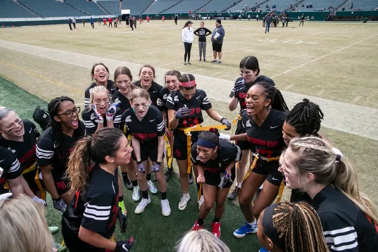 The Archbishop Ryan High School team huddles up before a scrimmage at Lincoln Financial Field on March 5, 2022.