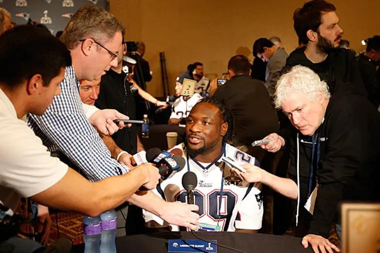New England Patriots running back LeGarrette Blount (29) answers questions during a press conference at Chandler Wild Horse Pass. (Matthew Emmons/USA Today)