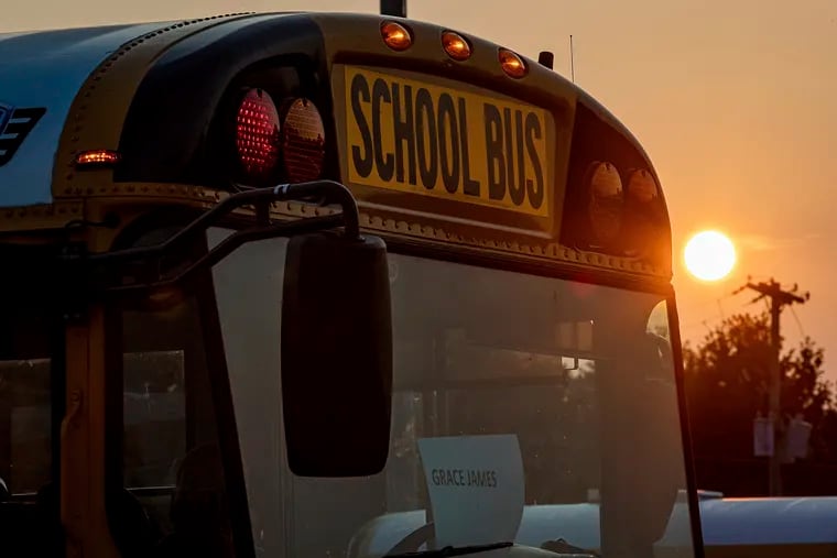 The sun rises on the first day of school at the Jefferson County Public Schools Detrick Bus Compound at 3686 Parthenia Ave., in 2023, in Louisville, Ky.