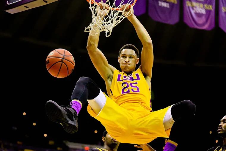 LSU Tigers forward Ben Simmons (25) slam dunks against the Kennesaw State Owls during the first half of a game at the Pete Maravich Assembly Center.