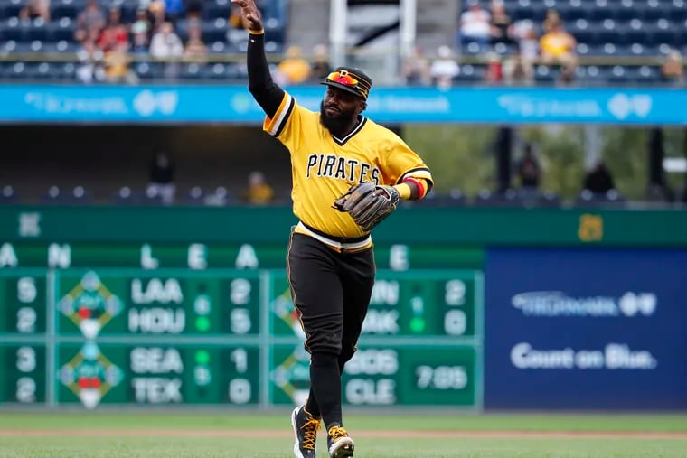 In this Sept. 23, 2018, file photo, Pittsburgh Pirates second baseman Josh Harrison acknowledges the fans as he leaves the field at PNC Park.