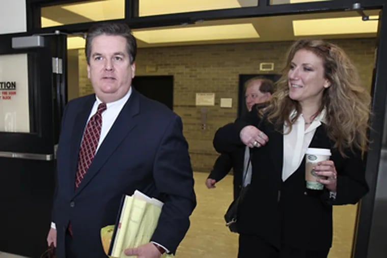 Susan Finkelstein arrives at the Bucks County Courthouse in
Doylestown with her attorney William J. Brennan on March 24, 2010. Behind them is her husband, Jack LaVoy. Finkelstein faces a jury trial on prostitution charges for allegedly offering sex for World Series tickets.