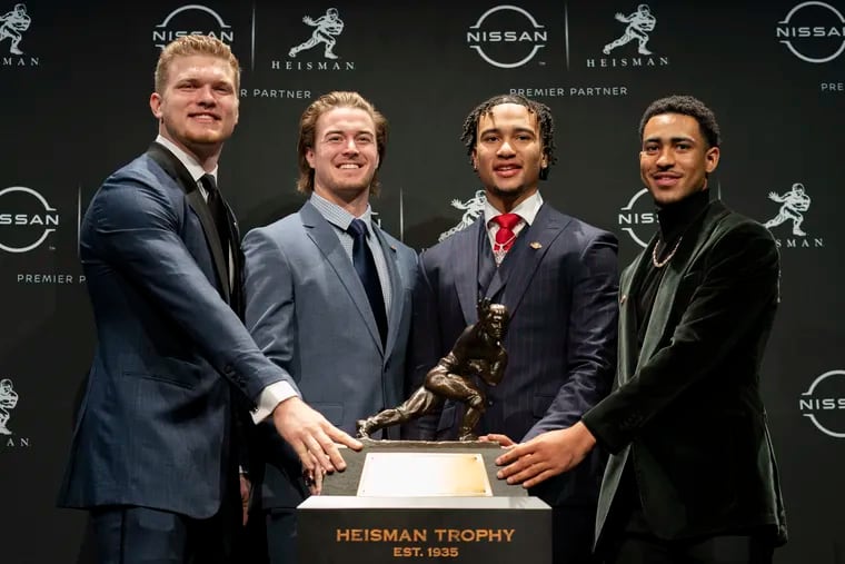 Heisman trophy finalists, from left, Michigan defensive end Aidan Hutchinson, Pittsburgh quarterback Kenny Pickett, Ohio State quarterback C.J. Stroud, and Alabama quarterback Bryce Young.