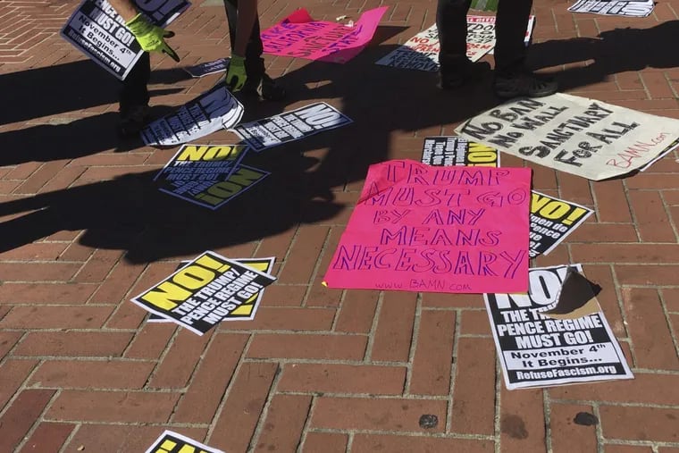 Protest banners litter the ground after a brief appearance Sept. 24 by Milo Yiannopoulos at the University of California, Berkeley.