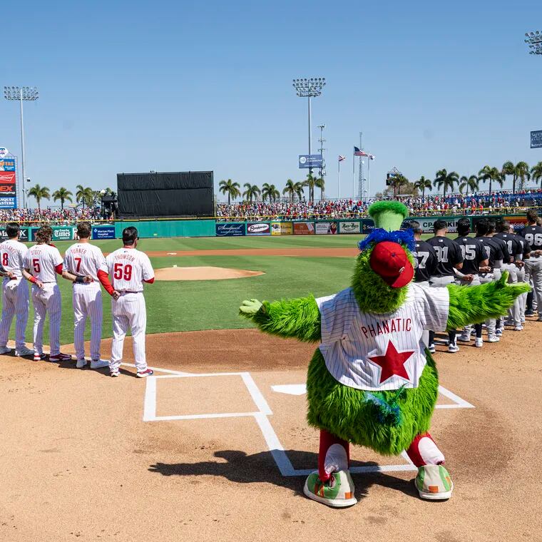 Phillies players line up during their home opener against the New York Yankees on Sunday, Feb 25, 2024 at BayCare Ballpark in Clearwater, FL.