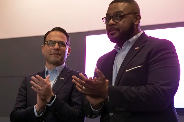 State Rep. Austin Davis (right), who is running for lieutenant governor of the state, at a rally with Josh Shapiro in Philadelphia on May 6, 2022.