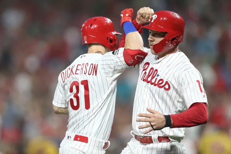 Phillies' Corey Dickerson celebrates his two run homer against the Braves bring home Rhys Hoskins at right during the 1st inning at Citizens Bank Park in Philadelphia, Tuesday, September 10, 2019