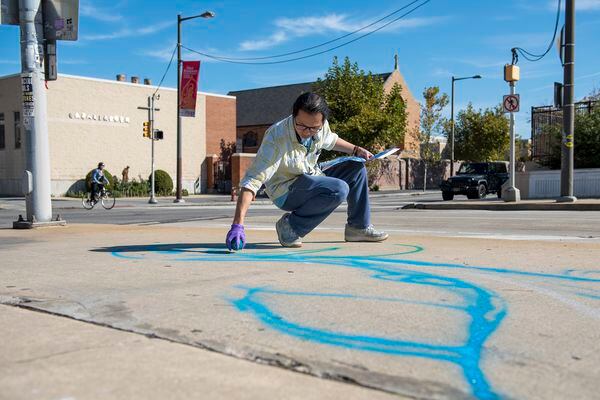 This Chinese artist just started his dream project of painting a mural in Philadelphia’s Chinatown