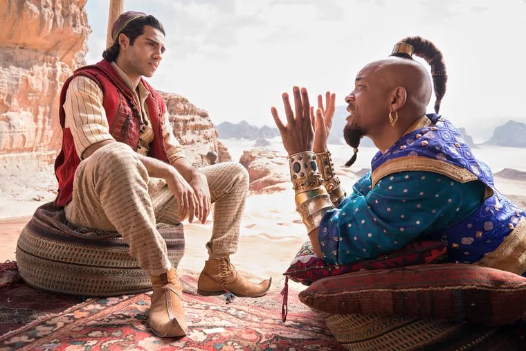(L-r) Mena Massoud and Will Smith in "Aladdin." MUST CREDIT: Daniel Smith, Walt Disney Pictures