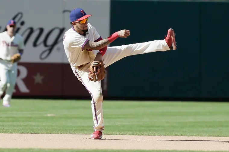 Phillies shortstop J.P. Crawford fields a ground ball on Sunday.
