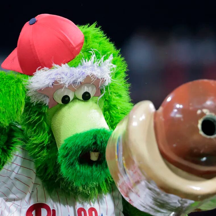 The Phillie Phanatic gets set to launch hot dogs during the Chicago Cubs at Philadelphia Phillies MLB game in 2021.