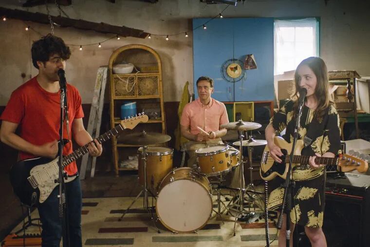 In "Band Aid," Adam Pally as Ben (left) and Zoe Lister-Jones as Anna (right), with Fred Armisen as Dave.
