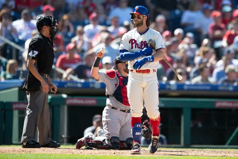 Bryce Harper was ejected from Sunday's Red Sox-Phillies game at Citizens Bank Park after he disagreed with a called third strike in the fourth inning.