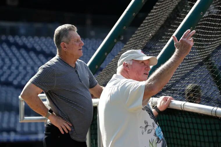Charlie Manuel (right) and Larry Bowa have become unlikely friends.