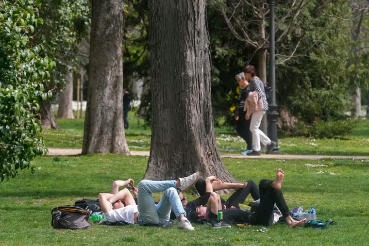 People relax in the Retiro park in Madrid, Spain, on March 2. Another month, another heat record for the planet. Earth just had its warmest March ever recorded, the 10th month in a row to set such a record, according to the European Union climate agency Copernicus.