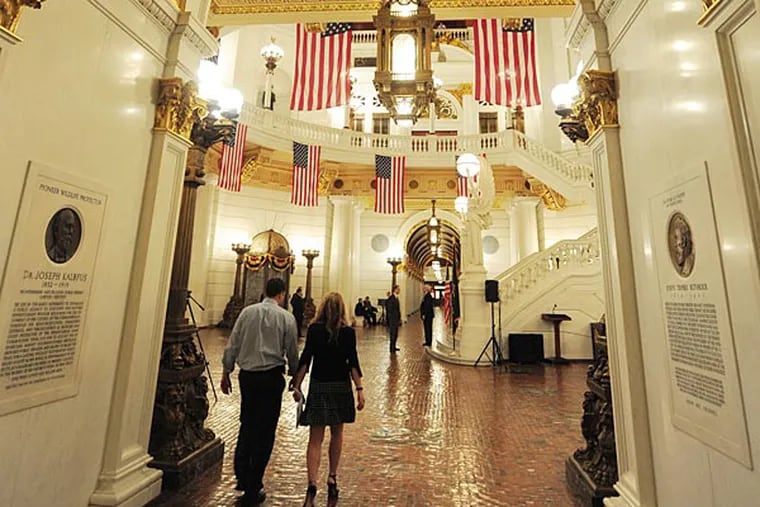 The halls of the Pennsylvania Capitol rotunda are quiet as state legislators carry on debate on Monday, June 30, 2014 in Harrisburg, Pa. Pennsylvania remains the last state in the union without new spending authority for the fiscal year that begins Tuesday. (AP Photo/Bradley C Bower)