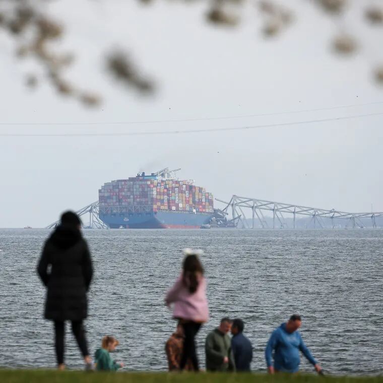A view from Fort McHenry of the Francis Scott Key Bridge after a container ship slammed into it on the Patapsco River in Baltimore, Maryland on Tuesday, March 26, 2024.