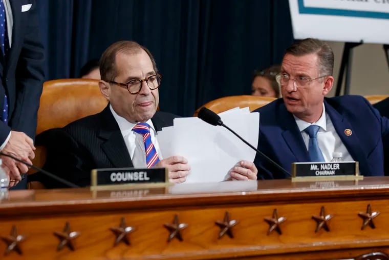 House Judiciary Committee Chairman Rep. Jerrold Nadler, D-N.Y., left, gathers his papers as ranking member Rep. Doug Collins, R-Ga., talks after the House Judiciary Committee hearing on the constitutional grounds for the impeachment of President Donald Trump.