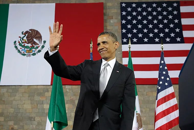 US President Barack Obama waves after speaking at the Anthropology Museum in Mexico City, Friday, May 3, 2013. (AP Photo/Pablo Martinez Monsivais)